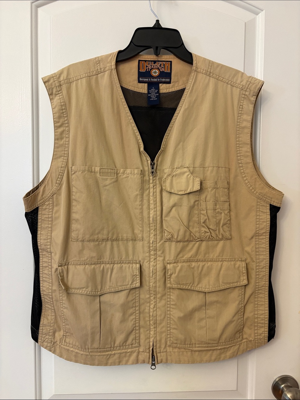 Duluth Trading Co khaki utility vest with multiple pocket inside mash size L